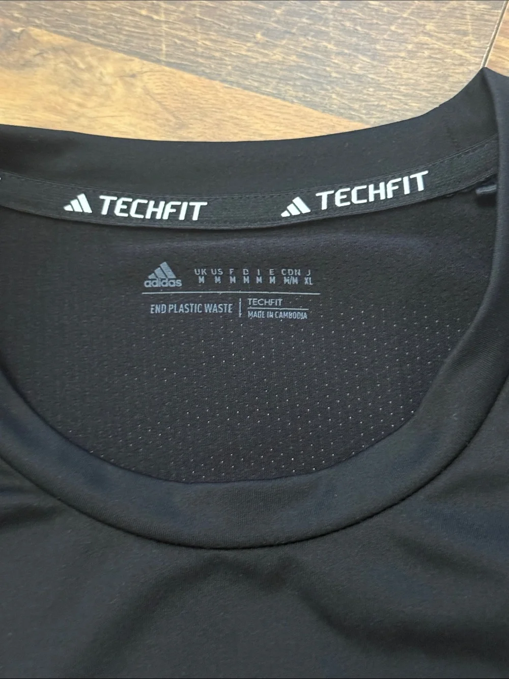 adidas Black Short-Sleeve Performance Tee with White Shoulder Stripes